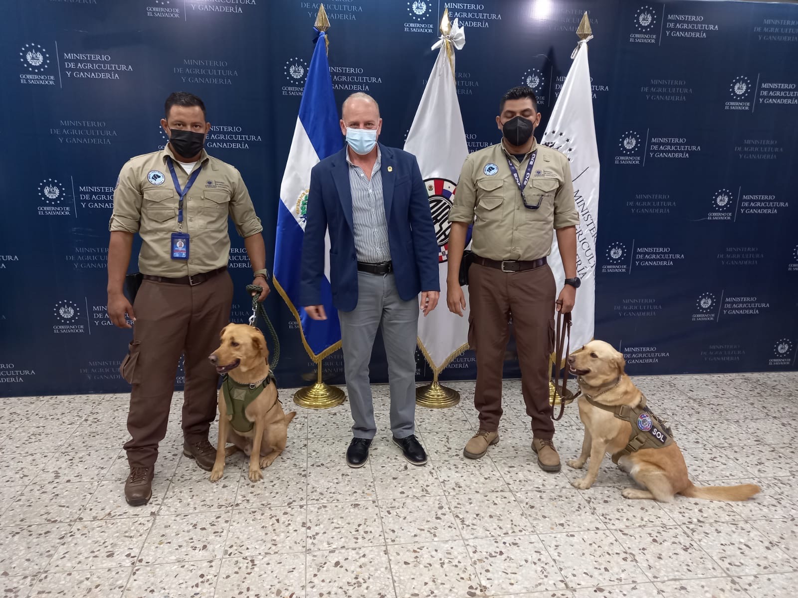 Alex Hasbun with agricultural canine inspection units at El Salvador's Ministry of Agriculture and Livestock