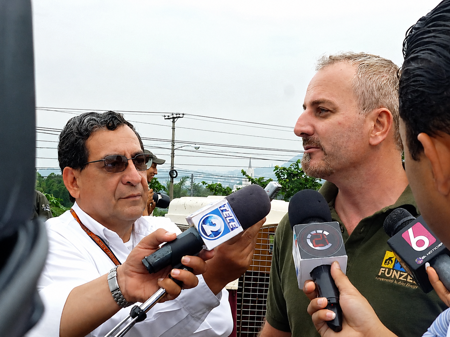 Alex Hasbun speaking during an outdoor press interview as Executive Director of FUNZEL
